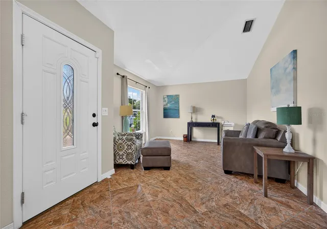 Photo 3 of Single family home for sale at 1406 Woodcrest Ln, North Port, FL 34286 | MLS# C7529930 | Listing updated on 2026-10-07