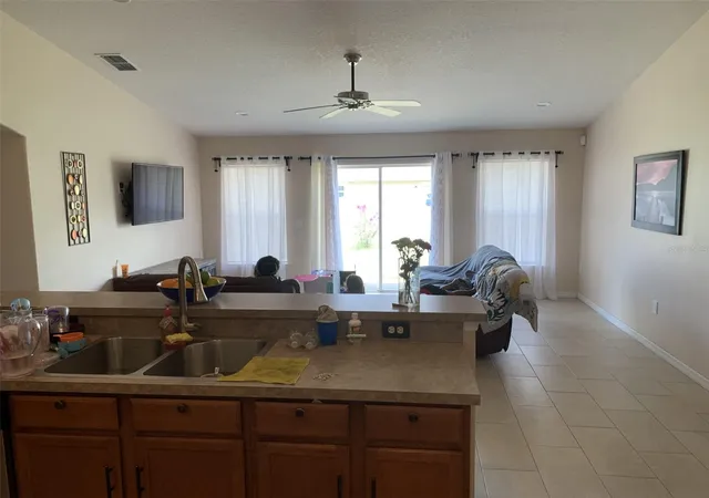Photo 2 of Single family home for sale at 1734 Minnow Ct, Poinciana, FL 34759 | MLS# S5156221 | Listing updated on 2026-08-31