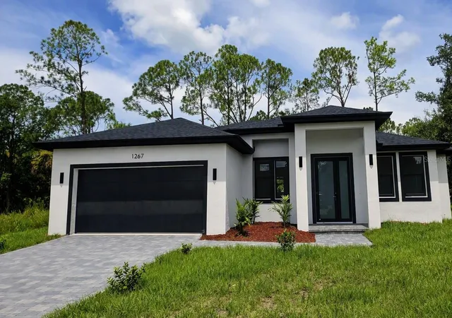 Photo 1 of Single family home for sale at 1267 Henning St, North Port, FL 34288 | MLS# O6436294 | Listing updated on 2026-10-08