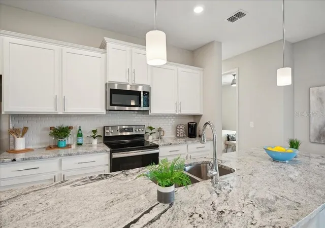 4th image of 64 Bunker Hill Dr, Palm Coast, FL 32137 | MLS# O6436321