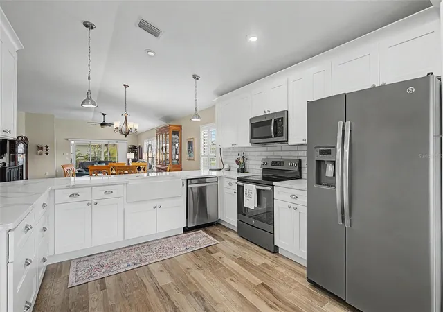 Photo 4 of Single family home for sale at 1004 Sweet Jasmine Dr, Trinity, FL 34655 | MLS# W7888882 | Listing updated on 2026-09-21