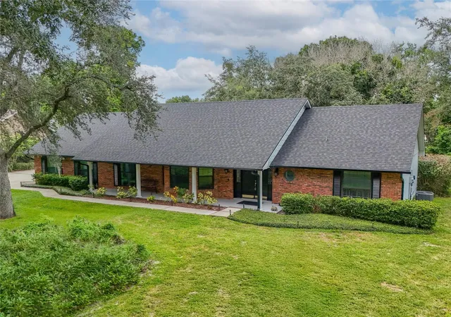 Photo 1 of Single family home for sale at 7141 Wooded Village Ln, Orlando, FL 32835 | MLS# O6436400 | Listing updated on 2026-09-13