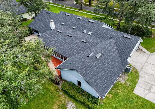 Photo 3 of Single family home for sale at 7141 Wooded Village Ln, Orlando, FL 32835 | MLS# O6436400 | Listing updated on 2026-09-13
