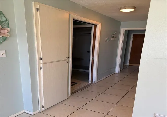 Listing Photo 2 - Condo for sale in building located at 4340 Tahitian Gdns Cir, Holiday, FL 34691 - Unit #D