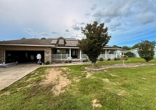 1st image of 12 E Lemon St, Davenport, FL 33837 | MLS# P4939702