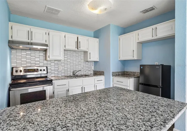 Photo 3 of Single family home for sale at 4821 Shoshone St, Orlando, FL 32819 | MLS# O6436436 | Listing updated on 2026-10-26