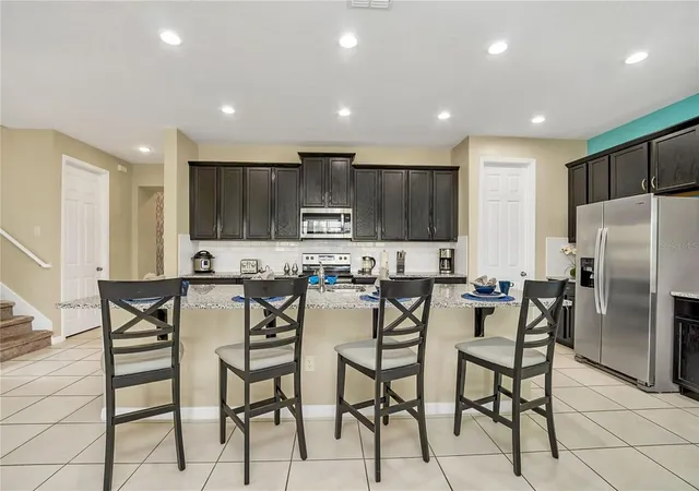 Photo 4 of Single family home for sale at 1576 Nassau Point Trl, Kissimmee, FL 34747 | MLS# O6436445 | Listing updated on 2026-08-27