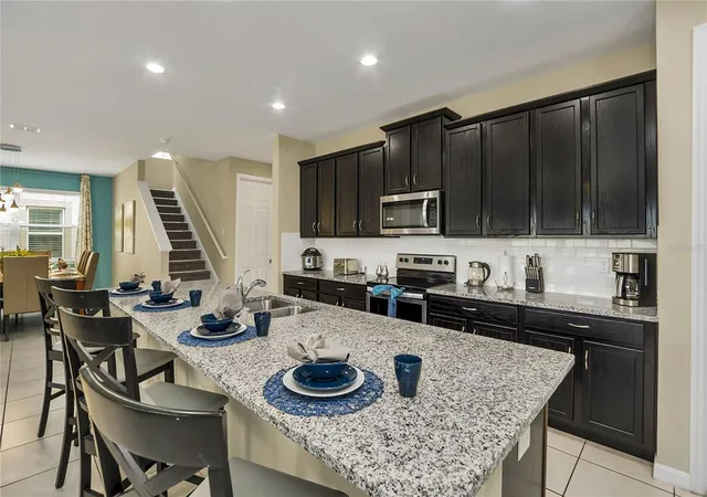 Photo 5 of Single family home for sale at 1576 Nassau Point Trl, Kissimmee, FL 34747 | MLS# O6436445 | Listing updated on 2026-08-27