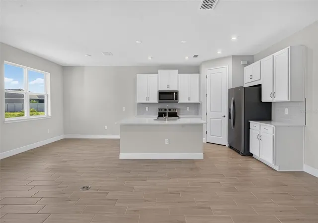 Photo 3 of Single family home for sale at 12430 51St St E, Parrish, FL 34219 | MLS# TB8542279 | Listing updated on 2026-10-28