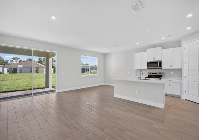 Photo 4 of Single family home for sale at 12430 51St St E, Parrish, FL 34219 | MLS# TB8542279 | Listing updated on 2026-10-28