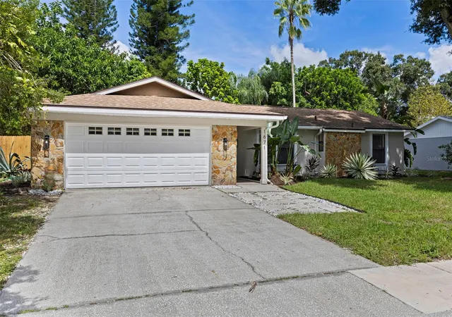 Photo 1 of Single family home for sale at 1671 Castlewood Ln, Palm Harbor, FL 34683 | MLS# TB8542290 | Listing updated on 2026-10-07