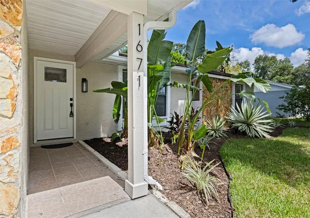 Photo 2 of Single family home for sale at 1671 Castlewood Ln, Palm Harbor, FL 34683 | MLS# TB8542290 | Listing updated on 2026-10-07