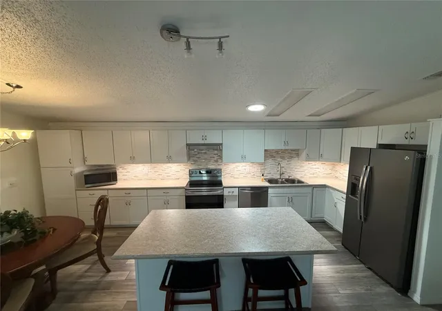 Photo 2 of Manufactured home for sale at 802 Oak Blvd, Wildwood, FL 34785 | MLS# G5116950 | Listing updated on 2026-10-01