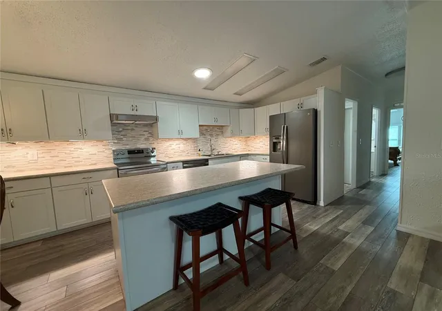 Photo 3 of Manufactured home for sale at 802 Oak Blvd, Wildwood, FL 34785 | MLS# G5116950 | Listing updated on 2026-10-01