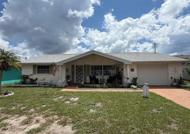 Photo 1 of Single family home for sale at 1332 Flotilla Dr, Holiday, FL 34690 | MLS# TB8542308 | Listing updated on 2026-09-02