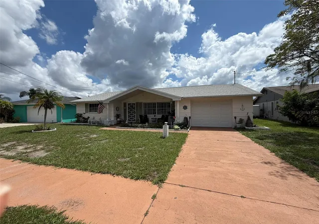 Photo 2 of Single family home for sale at 1332 Flotilla Dr, Holiday, FL 34690 | MLS# TB8542308 | Listing updated on 2026-09-02
