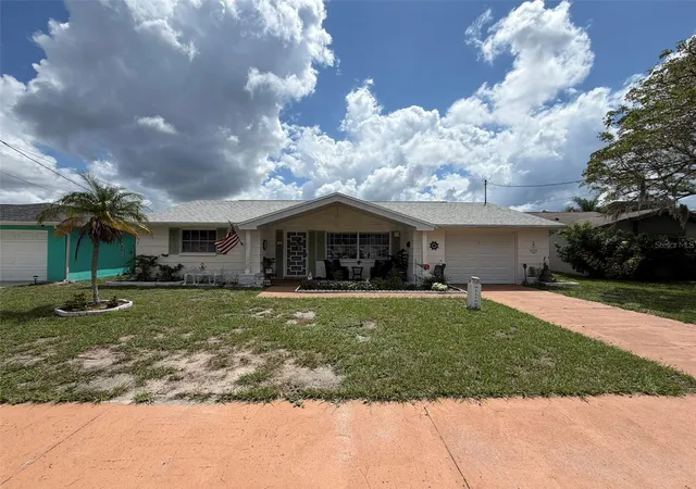 Photo 33 of Single family home for sale at 1332 Flotilla Dr, Holiday, FL 34690 | MLS# TB8542308 | Listing updated on 2026-09-02