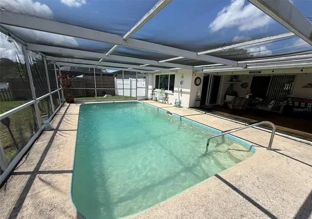 Photo 3 of Single family home for sale at 1332 Flotilla Dr, Holiday, FL 34690 | MLS# TB8542308 | Listing updated on 2026-09-02