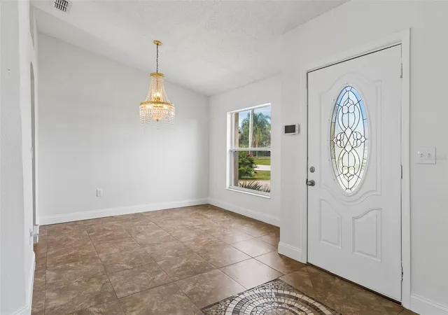 Photo 3 of Single family home for sale at 304 Jacksonville Ct, Kissimmee, FL 34759 | MLS# O6436512 | Listing updated on 2026-10-23