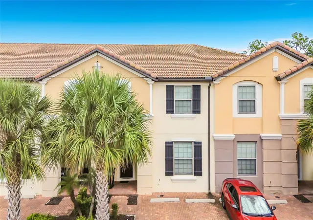 Photo 1 of Townhouse for sale at 8891 Geneve Ct, Kissimmee, FL 34747 | MLS# O6436535 | Listing updated on 2026-08-27