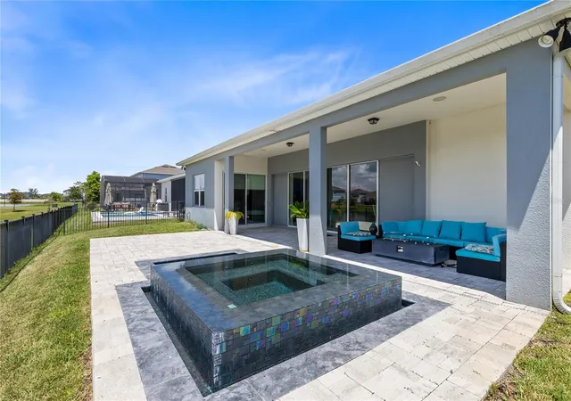 Photo 3 of Single family home for sale at 13828 Tybee Beach Ln, Orlando, FL 32827 | MLS# O6436555 | Listing updated on 2026-09-14