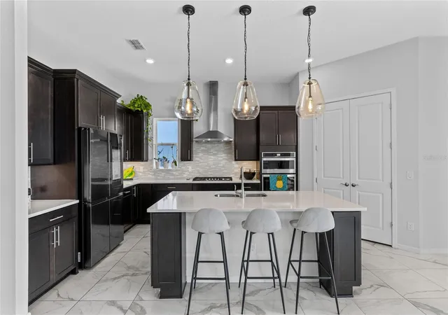 Photo 3 of Single family home for sale at 13828 Tybee Beach Ln, Orlando, FL 32827 | MLS# O6436555 | Listing updated on 2026-09-14