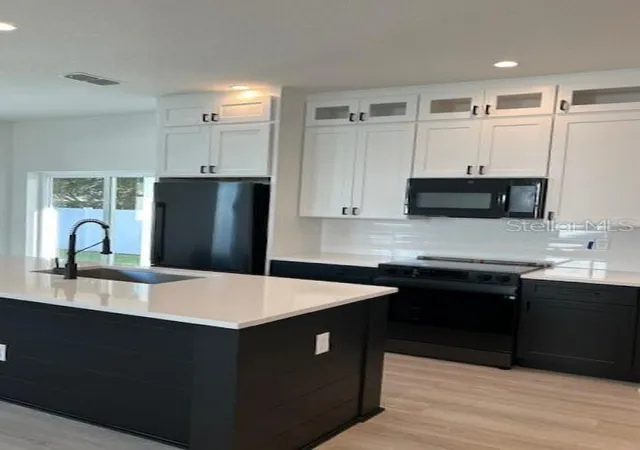 Photo 4 of Single family home for sale at 2051 Peel Ave, Orlando, FL 32806 | MLS# O6436574 | Listing updated on 2026-08-26