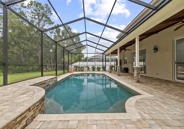 Photo 3 of Single family home for sale at 15713 Muirfield Dr, Odessa, FL 33556 | MLS# TB8542429 | Listing updated on 2026-10-07