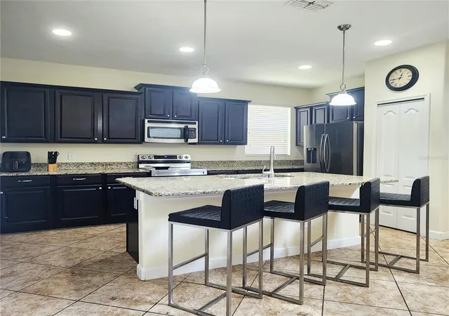 Photo 3 of Single family home for sale at 8935 Cuban Palm Rd, Kissimmee, FL 34747 | MLS# O6436601 | Listing updated on 2026-09-13