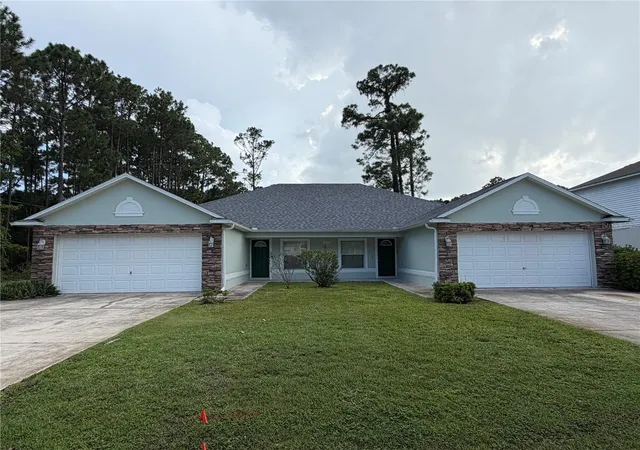Photo 1 of Multi family home for sale at 18 Lloleeta Path, Palm Coast, FL 32164 | MLS# FC320980 | Listing updated on 2026-09-01
