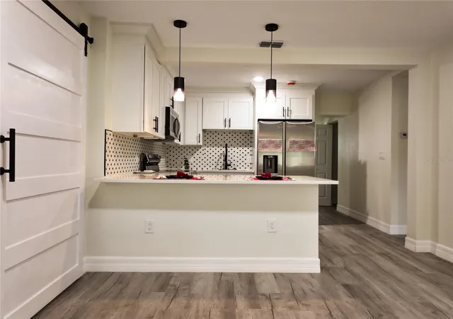 Photo 2 of Single family home for sale at 919 W Hiawatha St, Tampa, FL 33604 | MLS# TB8542464 | Listing updated on 2026-09-04