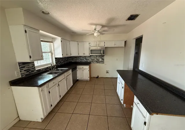 Photo 3 of Sale Pending at 3608 Tam Dr, Orlando, FL 32808 | MLS# O6436606 | Listing updated on 2026-10-08
