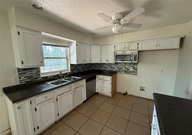 Photo 4 of Sale Pending at 3608 Tam Dr, Orlando, FL 32808 | MLS# O6436606 | Listing updated on 2026-10-08