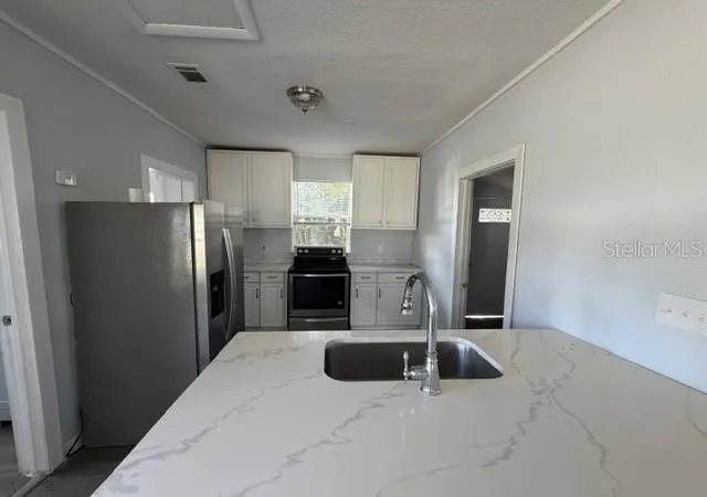 Photo 3 of Single family home for sale at 295 S Oak Ave, Bartow, FL 33830 | MLS# S5156314 | Listing updated on 2026-08-26