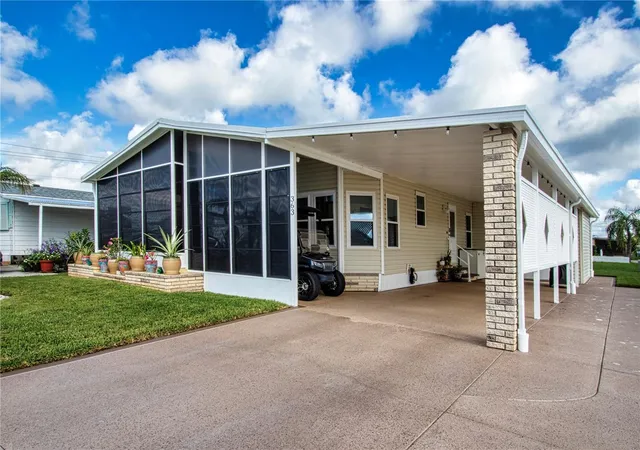 Photo 2 of Manufactured home for sale at 363 Captains Ct, North Port, FL 34287 | MLS# A4704069 | Listing updated on 2026-09-04