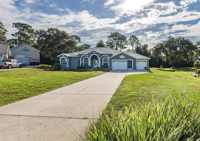 Photo 2 of Single family home for sale at 11382 Doxsey Hl Cir, Spring Hill, FL 34609 | MLS# W7888909 | Listing updated on 2026-09-01