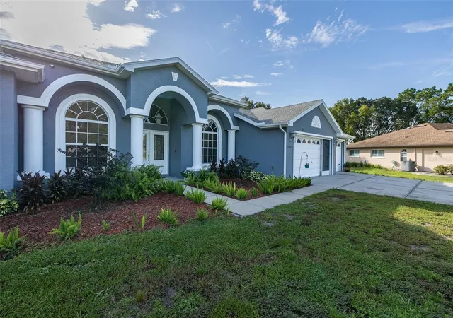 Photo 5 of Single family home for sale at 11382 Doxsey Hl Cir, Spring Hill, FL 34609 | MLS# W7888909 | Listing updated on 2026-09-01