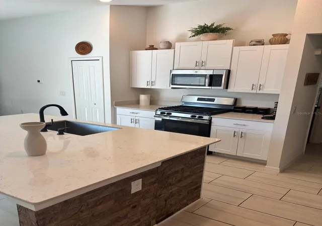 Photo 4 of Single family home for sale at 22481 Storybook Cabin Wy, Land O Lakes, FL 34637 | MLS# TB8542508 | Listing updated on 2026-10-14