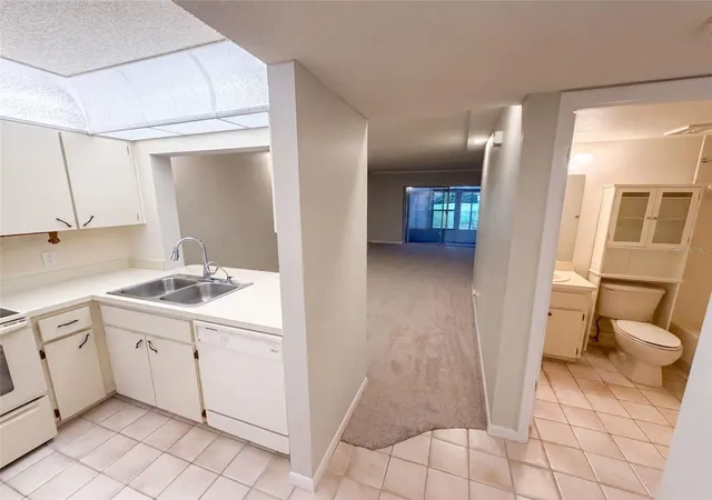 Photo 2 of Condo for sale at 1465 Millstream Ln #104, Dunedin, FL 34698 | MLS# O6436635 | Listing updated on 2026-09-22
