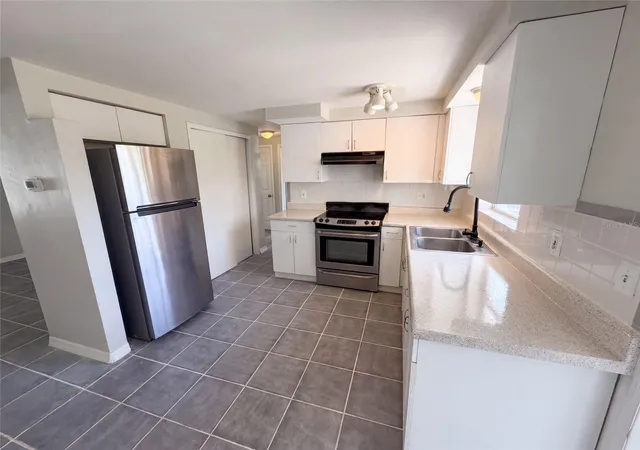 Photo 4 of Single family home for sale at 4718 Trafford Rd, Holiday, FL 34690 | MLS# O6436638 | Listing updated on 2026-10-09