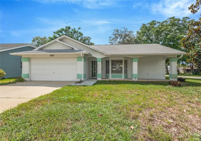 Photo 1 of Single family home for sale at 10811 Peppertree Ln, Port Richey, FL 34668 | MLS# TB8542520 | Listing updated on 2026-08-29