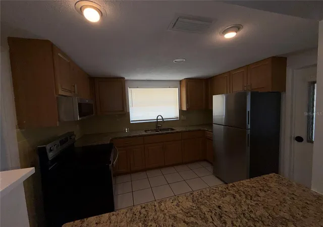 Photo 3 of Single family home for sale at 7905 Mimosa Dr, Port Richey, FL 34668 | MLS# TB8542549 | Listing updated on 2026-08-27