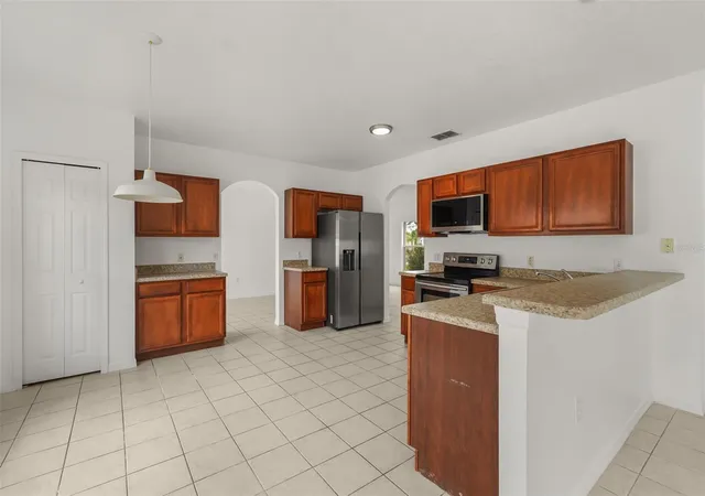 Photo 3 of Single family home for sale at 1348 Nelson Park Ct, Kissimmee, FL 34759 | MLS# O6436683 | Listing updated on 2026-10-23