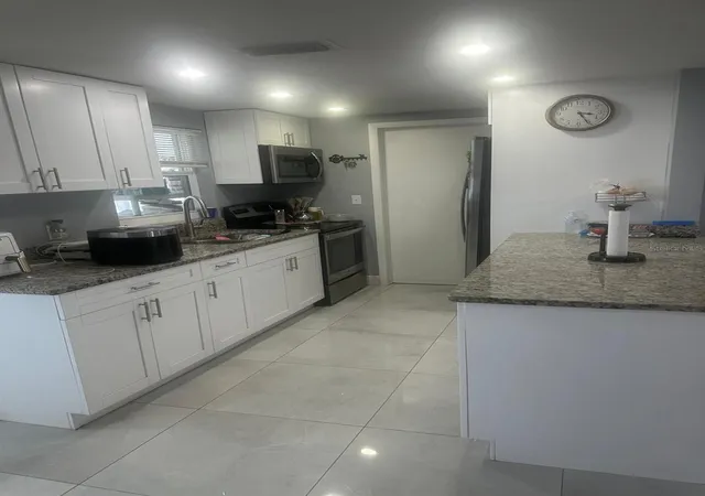 Photo 4 of Single family home for sale at 11719 Enterprise Dr, Port Richey, FL 34668 | MLS# L4964570 | Listing updated on 2026-10-02