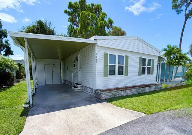 Photo 1 of Manufactured home for sale at 2068 Ca D Oro Dr, Sarasota, FL 34238 | MLS# TB8542611 | Listing updated on 2026-09-04
