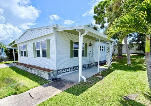 Photo 3 of Manufactured home for sale at 2068 Ca D Oro Dr, Sarasota, FL 34238 | MLS# TB8542611 | Listing updated on 2026-09-04