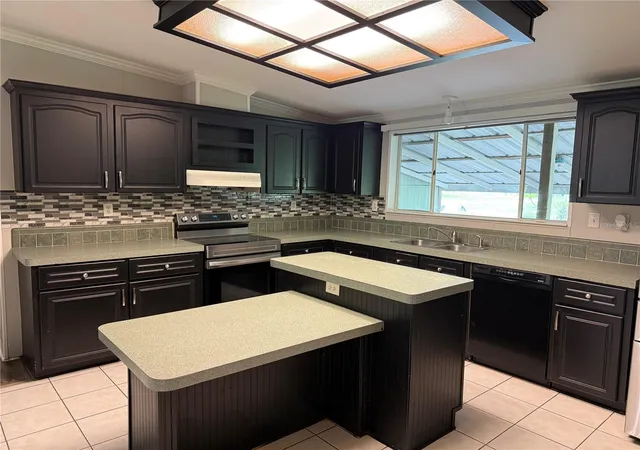 Photo 2 of Manufactured home for sale at 3704 Garon Ave, Ruskin, FL 33570 | MLS# A4704104 | Listing updated on 2026-08-28