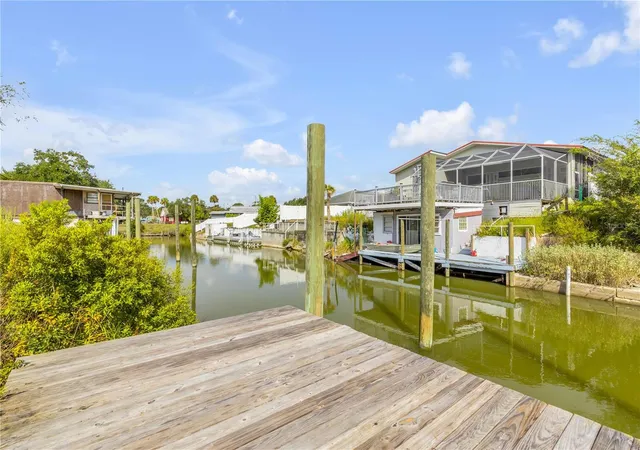 Photo 2 of Single family home for sale at 128 Indian Creek Rd, Oak Hill, FL 32759 | MLS# NS1089103 | Listing updated on 2026-10-01