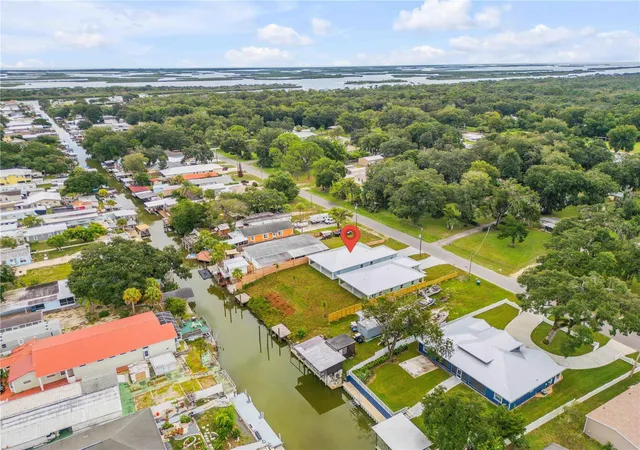 Photo 3 of Single family home for sale at 128 Indian Creek Rd, Oak Hill, FL 32759 | MLS# NS1089103 | Listing updated on 2026-10-01
