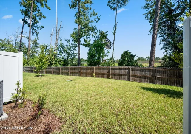 Photo 3 of Townhouse for sale at 514 Hollylakes Dr, Orange Park, FL 32073 | MLS# FC320991 | Listing updated on 2026-09-26